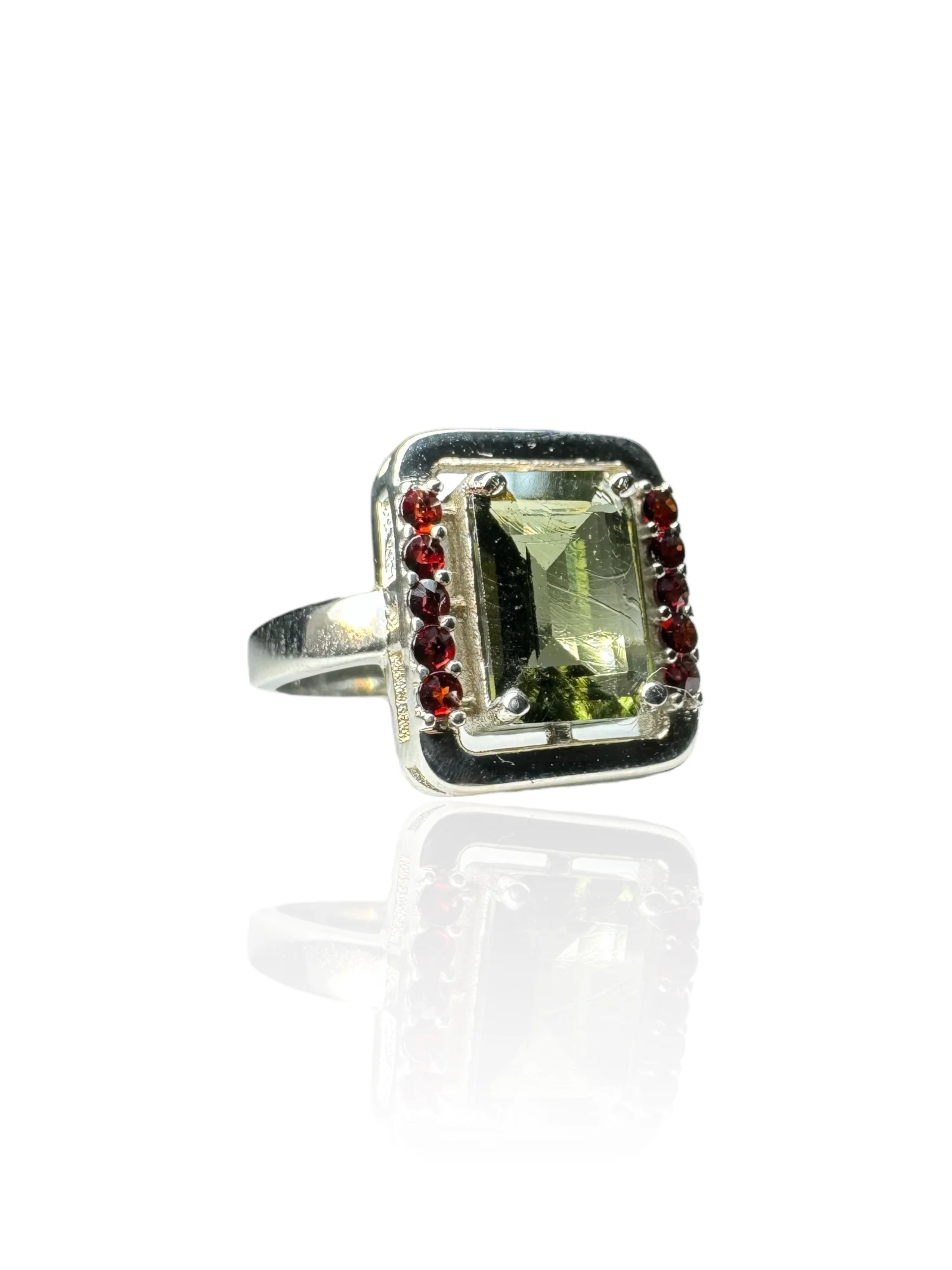 Moldavite ring with garnets