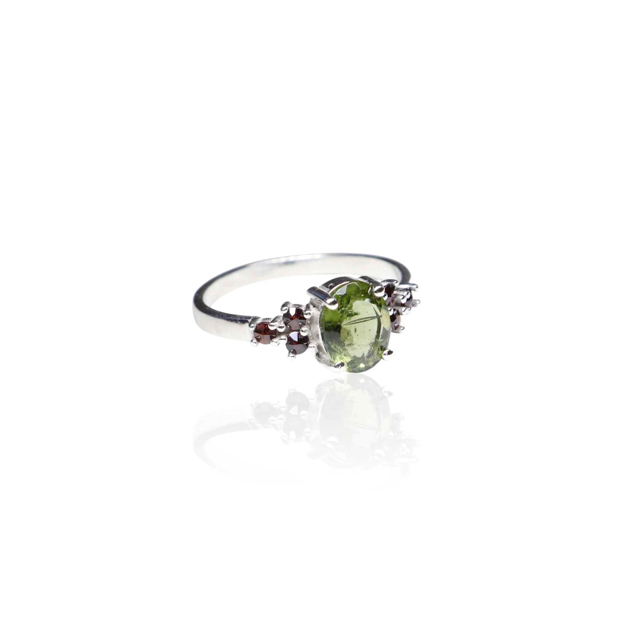 Moldavite ring oval with garnets