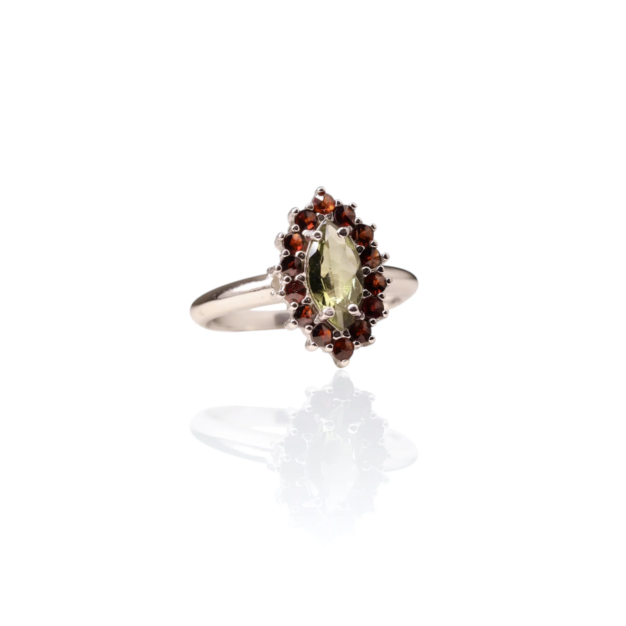 Moldavite ring with garnets